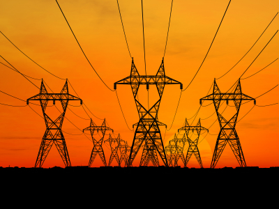 3D Electric powerlines over sunrise